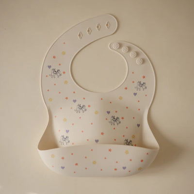 Babador De Silicone Infantil Mushie Bluey Ivory - Fácil de Limpar